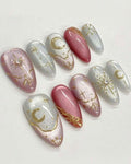 Starry Pink and White Cateye Almond Shaped Press-On Nails